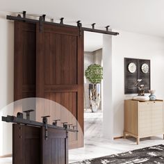 an open sliding door in a living room next to a dresser and table with vases on it