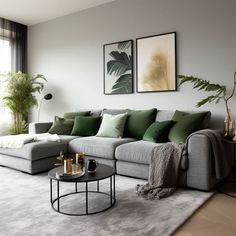 a living room filled with lots of furniture and green pillows on top of the couch