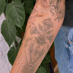 a person with a tattoo on their arm