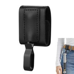 a black leather belt clip holder with a woman's white shirt in the background