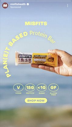 a hand holding up a bar of protein with the words misfits on it