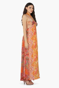 The Multi Palm Paisley Maxi Dress is a stunning and vibrant ensemble with a delightful paisley print. This maxi dress is fully lined and features a V-halter tie band with a ring detail at the bust area. The side cutouts add to the oomph factor. The mix of the print and silhouette adds a tropical and bohemian touch, making this dress a perfect choice for summer events or beachside occasions. A drawstring tie at the back of the neck adds a charming detail while offering additional adjustability. T Paisley Maxi Dress, Summer Events, Gathered Skirt, Bag Dress, Body Shape, Stripe Print, Paisley Print, Playsuit Jumpsuit, Dress Accessories