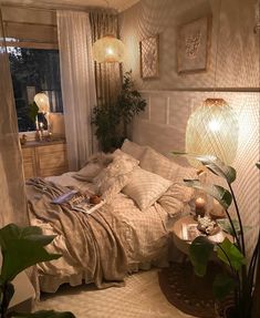 a bed room with a neatly made bed and plants