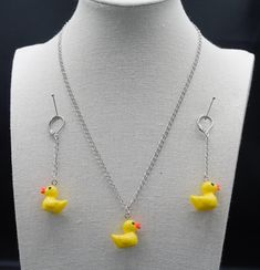 Rubber Ducky, you're the one!   Rubber ducky necklace is 23 inches, earrings dangle at 2 1/2 inches. You're The One, Rubber Ducky, Charm Necklaces, Necklace And Earrings Set, Des Moines, Necklace And Earrings, Earrings Dangle, Earrings Set, Halloween Shopping