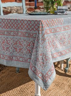 a table with a blue and red cloth on it