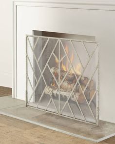 a fireplace with a fire in the middle