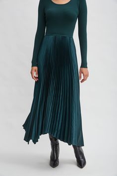 Our effortless Pleated Midi Dress has a distinct modern vibe. The Long Sleeve viscose sweater knit bodice combines with a pleated skirt with graphic handkerchief hem. Definitely poetry in motion! Long Sleeve Knit Bodice Pleated Midi Dress Bodice: 51% Spandex, 32% Viscose, 17% Nylon; Skirt: 98% Polyester, 2% spandex Runs true to Size Model is 5'9" and wearing size S Dry Clean Only Imported Style #: ETR44225 Mixed Media Dress, Swimsuit Cover Up Dress, Long Sleeve Short Dress, Pleated Midi Dress, Elie Tahari, Mix Media, Cover Up Dress, Skirts For Sale, Long Sleeve Knit