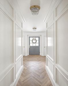 the instagram page on instagram shows an empty hallway with white walls and wood floors