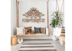 a white room with a wooden bench and potted plants