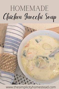 a bowl of chicken gnocchi soup on top of a table with a blue and white towel