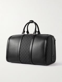 Gucci's duffle bag is a stylish travel companion. Made in Italy from leather and signature 'GG Supreme' coated-canvas, it comes with two top handles and a detachable shoulder strap. It has plenty of space for everything you need for a weekend trip. Duffle Bag For Men, Gucci Travel Bag, Gucci Travel, Gucci Collection, Tom Ford Bag, Canvas Duffle Bag, Pocket Books, Brand Clothes, Luxury Sneakers