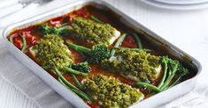 broccoli florets and green beans are in a pan on a table