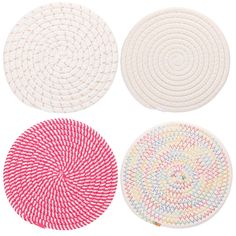 four circular rugs in different colors and patterns