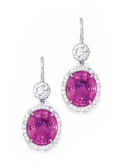 PAIR OF PLATINUM, PINK SAPPHIRE AND DIAMOND EARRINGS, BULGARI Set with two oval-shaped pink sapphires weighing 14.45 carats, framed and suspended by round diamonds weighing approximately 1.10 carats, signed Bulgari. Beauty Berries, Anodized Aluminum Jewelry, Green Lily, Titanic Jewelry, Bracelet And Ring, Orchid Color