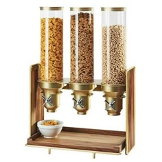 an automatic cereal dispenser with three different types of cereal