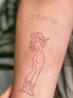 a person with a tattoo on their arm