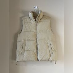 New Without Tags. Very Trendy Tan Puffer Vest. Cinch Drawstrings For A Completely Different Look. Zip Up Closure. High Neck. Very Warm, Great For Layering This Fall! Tan Puffer Vest, Puffer Vest, Puffer, Zip Ups, Layering, High Neck, Jackets & Coats, Jackets For Women, Cream