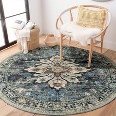 a round rug with an ornate design on it