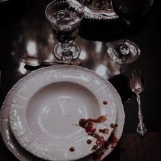 an empty plate is sitting on the table