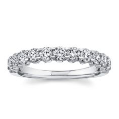 a white gold wedding band with round cut diamonds