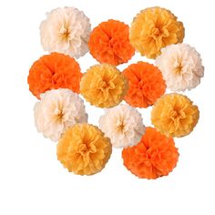 six orange and white tissue pom poms arranged in a circle