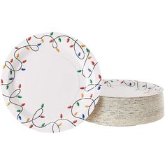 two white plates with christmas lights on them, one is empty and the other has a roll of tape