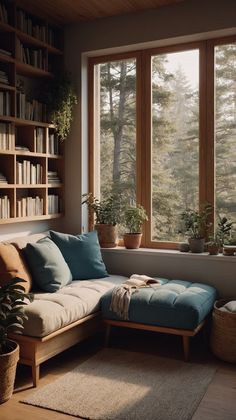 a living room filled with lots of furniture and windows covered in wooden bookshelves