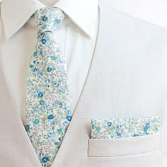 "Dapper Men's Bouquet In Blue Necktie Made By The Belle And The Beau! Our dapper, modern, stylish, and charming neckties are perfect for everyday, Sunday best, all special occasions, photography sessions, and especially dapper on grooms and groomsmen! They are the perfect wedding accessory. We use the best cotton and cotton blend fabrics. We love that cotton is so versatile to dress up or down for any occasion. Each tie is fully lined and professionally sewn. Our men's ties come in 2 length and Light Blue Accessories For Black Tie Event, Pastel Wildflower Wedding, Wedding Ideas Theme, Wedding Fun Ideas, Lit Wedding, Garden Party Brunch, Man Bouquet, Wildflower Wedding Theme, Grooms And Groomsmen