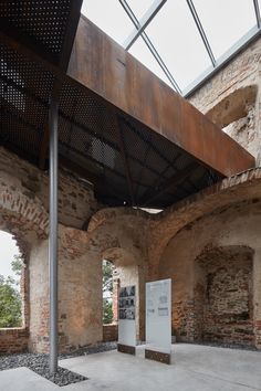 the inside of an old building with exposed brick walls