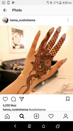 someone is showing off their henna tattoo