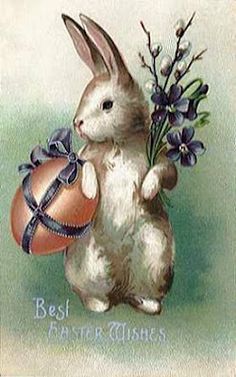 an easter card with a bunny holding a basket and flowers