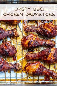 crispy bbq chicken drumsticks on a grill with the words, crispy bbq chicken drumsticks