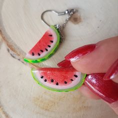 This Watermelon Earrings is the cutest, one of a kind Food jewelry that you have been looking for! If you want to wear cool fruit earrings or just searching for the perfect gift for a watermelon lover or vegan, then you have came to the right place! Make a statement with this statement earrings! D E T A I L S: * Handmade Watermelon Dangle Earrings * Made from Polymer Clay * Length: 2.9 inches (7.5 cm) * Earring posts: Stainless steel * Earrings arrive nicely packed in a eco friendly box You can Summer Gift Earrings With Ear Wire, Dangle Earrings As Summer Gifts, Cute Summer Jewelry For Gifts, Novelty Summer Jewelry Gift, Red Dangle Earrings For Summer, Novelty Jewelry Gift, Handmade Watermelon Earrings For Summer, Handmade Watermelon Color Earrings For Summer, Red Teardrop Summer Earrings