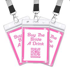 three pink luggage tags with black handles and white lettering on the front, one has a name tag that says buy the bride a drink