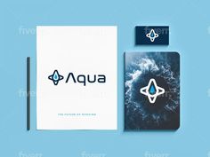 the logo for aqua is displayed next to a notebook and pen on a blue background