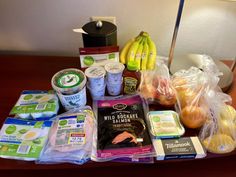 Groceries sitting on a table inside a hotel. Meals To Make In A Hotel Room, Stocked Mini Fridge Snacks, Hotel Meals No Microwave, Meal Prep For Hotel Stay, Healthy Hotel Snacks, Hotel Meal Prep