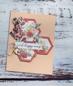 a close up of a card with flowers on it and a tag that says happy new year