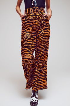 Subcategory: Pants. Print: Animal print. Fit: Relaxed fit. Leg: Straight. Style: Tailored. Detail: Belt of same fabric included. Fabric: Suede. Pockets: Side pockets . Zipper: Zip fastening. runs true to size. S. 100% Polyester Tiger Texture, Disney Dress Up, Disney Dress, Checkered Pants, Trouser Pants Women, Print Trends, Suede Fabric, Buckle Belt, Medium Brown