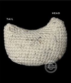 a white crocheted bag with the words tail, head and bottom on it