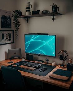 a desktop computer sitting on top of a wooden desk