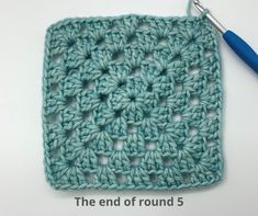 the crochet square is being worked on