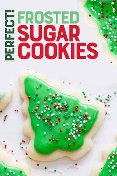 frosted sugar cookies with green and red sprinkles in the shape of a christmas tree