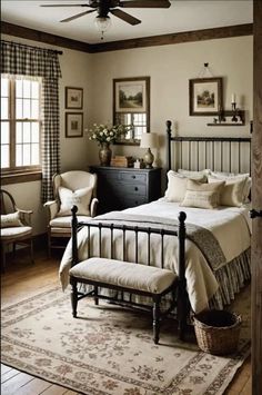 a bed room with a neatly made bed next to a window and a ceiling fan