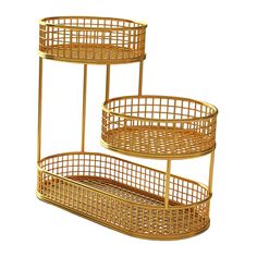 two gold metal baskets sitting on top of each other