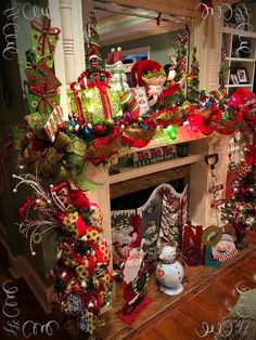 a fireplace decorated for christmas with stockings and ornaments