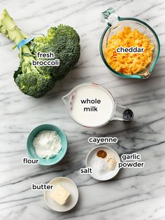 ingredients to make macaroni and cheese are shown on a marble counter top, including broccoli