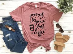 Powered by Pixie Dust and Coffee Shirt for Disney Women's - Etsy Womens Disney Shirts, Funny Mom Shirts, Coffee Shirts, Mom Tees, Love Shirt, Disney Shirts, Camping Shirt, Unisex Shirts, Teacher Shirts