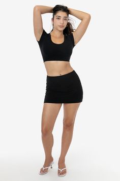 The Garment Dye Mini Tube Skort is made of our premium heavyweight cotton spandex and features a low to mid-rise fit. This skort is fitted through the hips, but not too tight around the base for ease of movement. This style features a full coverage brief and a hidden 1” elastic waistband for comfortable, stress-free wear. The inside briefs have a flattering, high cut leg opening and help maintain the lower rise of the skirt so it doesn't shift or rise up as you wear it. Try pairing this skort wi Tight Skirt Outfit, Skort Style, Spandex Top, Keds Style, Fasion Outfits, Cotton Spandex, Crop Tee, Skirt Outfits, All Fashion