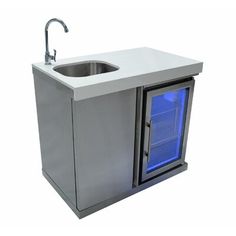 a stainless steel sink and cabinet with blue light under the faucet, on an isolated white background