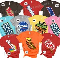 a group of t - shirts with different logos on them, all in different colors